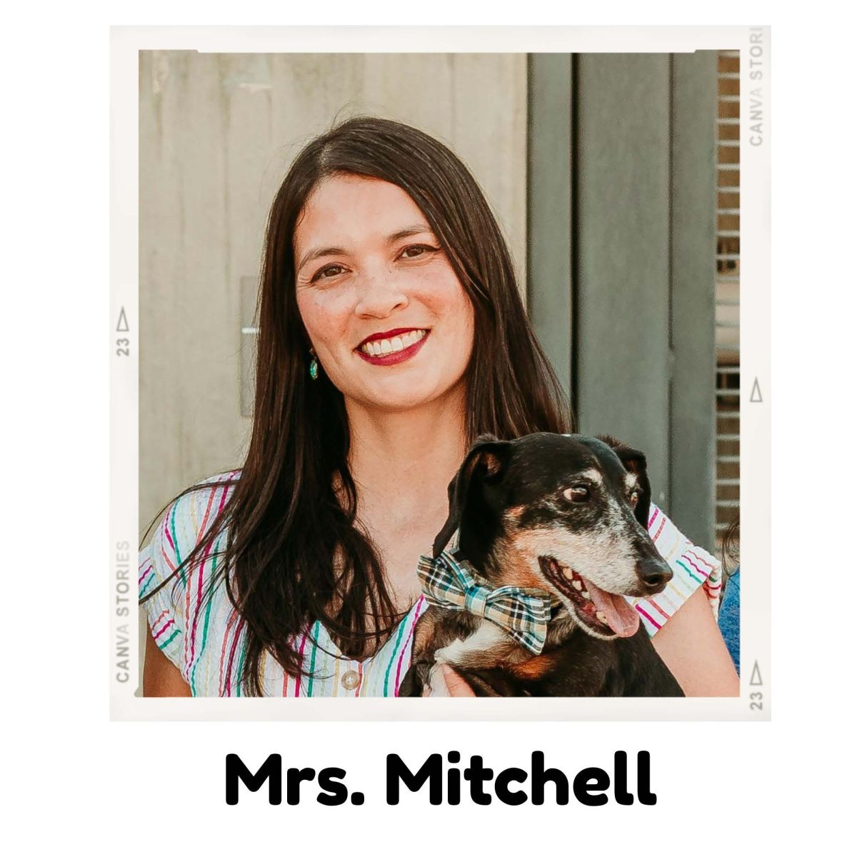 Mrs. Mitchell holding her dog